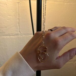 Face necklace